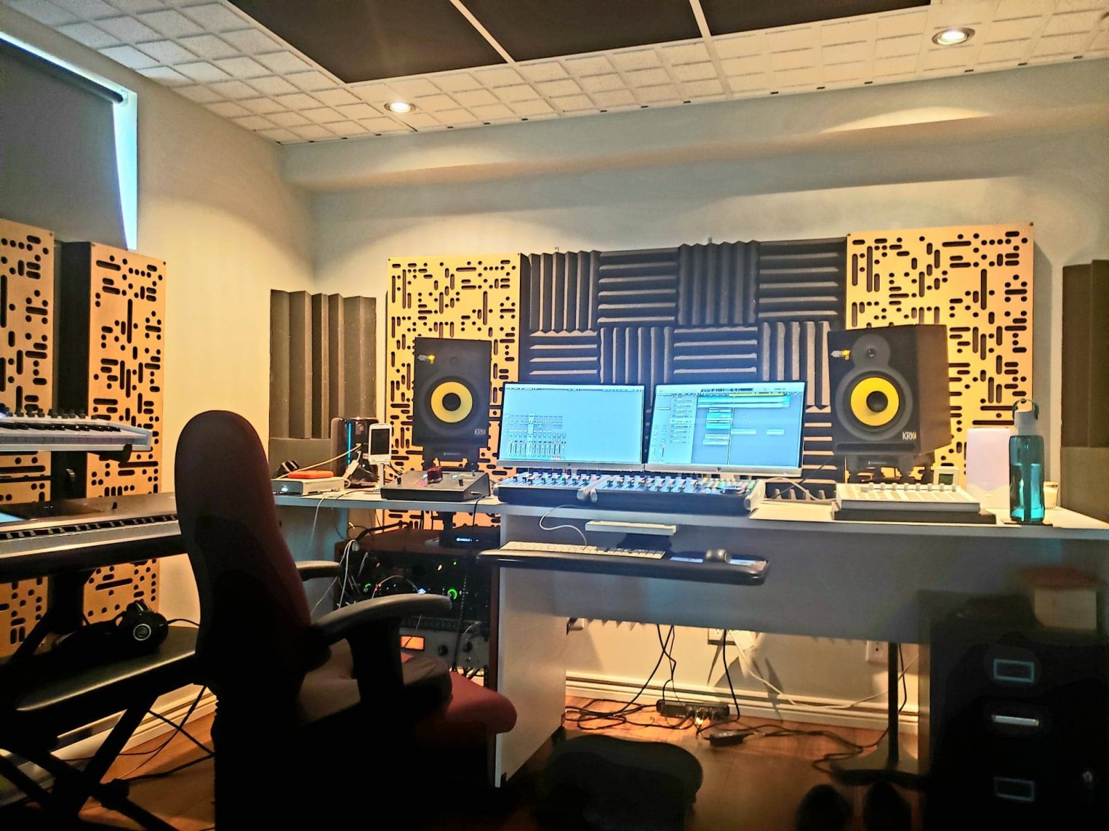 GIK Acoustics Amplitude panels installed on a studio wall